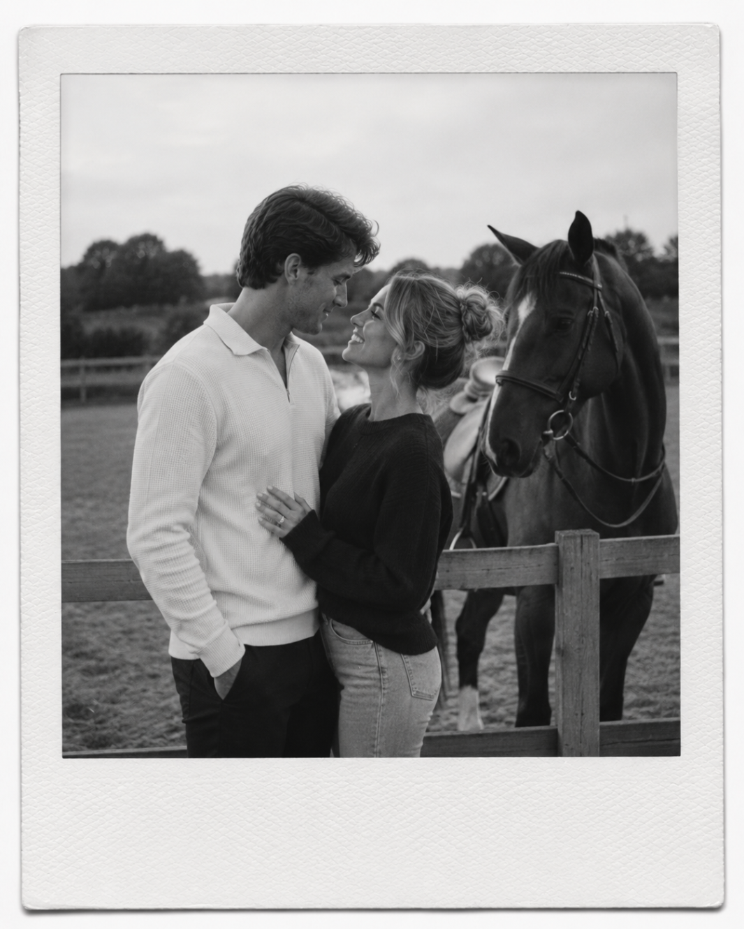 Amara and Isiah at the stables, in black and white